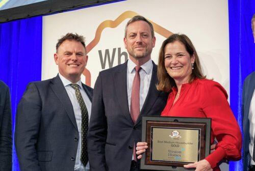 WhatHouse? Awards 2023 Best Medium Housebuilder with Stuart Thomas, Peter Gore and Suzanne Aplin accepting the trophy for Weston Homes